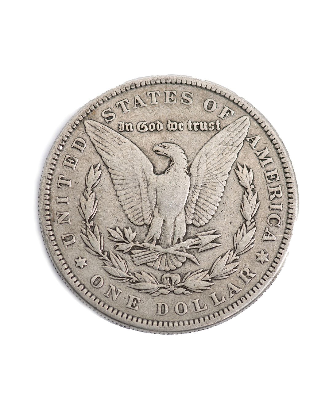 a bald eagle on a 1885 U.S. silver dollar