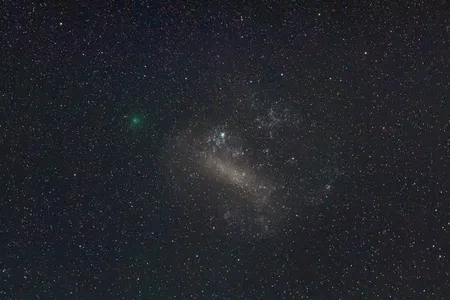 The green object is the comet 252P/LINEAR as it passed by the Larger Megellanic Cloud.