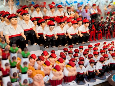 The Catalan Nativity character known as Caganer in the Santa Llucia Christmas Market, Barcelona, Spain.