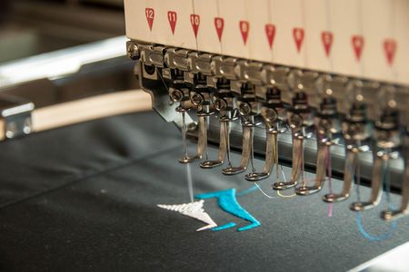Is this machine adding an antenna to the fabric?