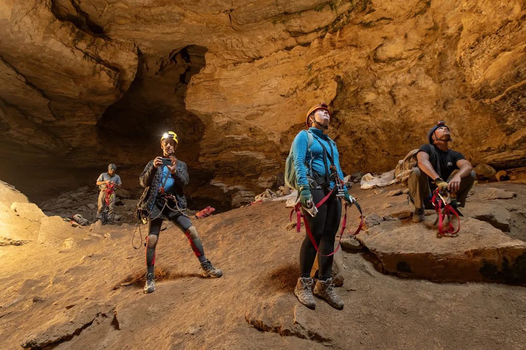 At the end of a workday, four team members— John Jacisin, Kai Getrost, Megan Hormell and Alex Lien—wait their turn to ascend the long fixed rope that will return them to the surface. It takes more than an hour for the full team to exit.