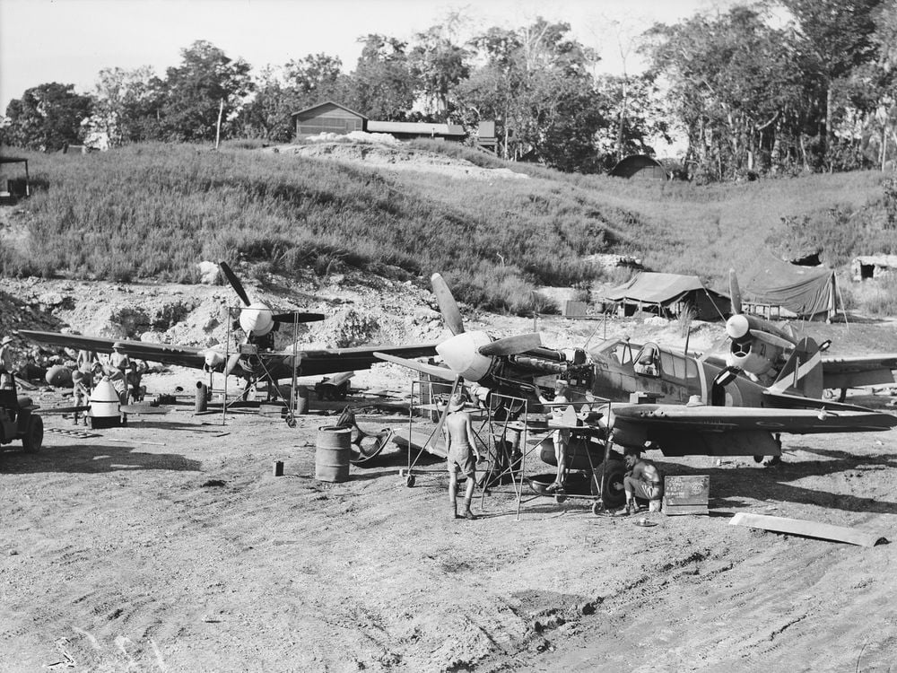 Ground crew servicing a group of Curtiss P-40 Kittyhawks. Presumed to be No. 1 Fighter Maintenance Unit at Kukum Field, Guadalcanal. (Photograph Courtesy of the Royal New Zealand Air Force Museum)