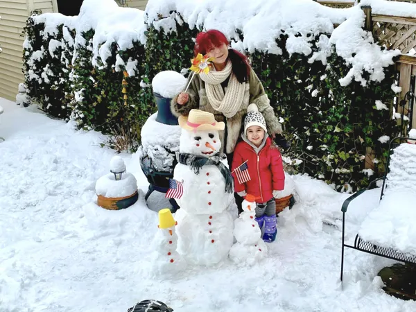 Building a snowman in grandma's backyard. thumbnail