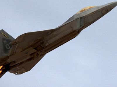 The F/A-22 Raptor performs aerial maneuvers during the Aviation Nation airshow on Nellis Air Force Base in November 2007.