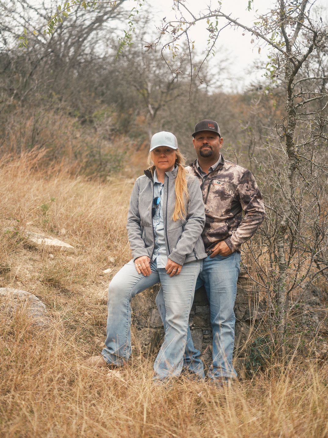 ranchers stand for a portait