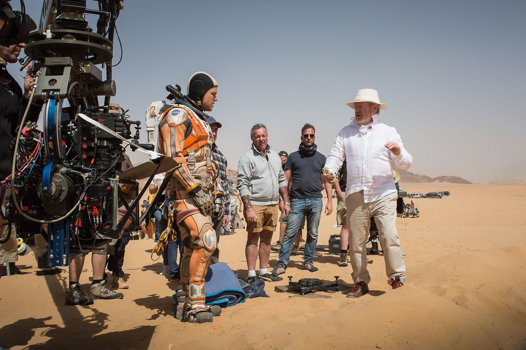 Damon and director Ridley Scott (far right) on location in Jordan (Aidan Monaghan:20th Century Fox).jpg