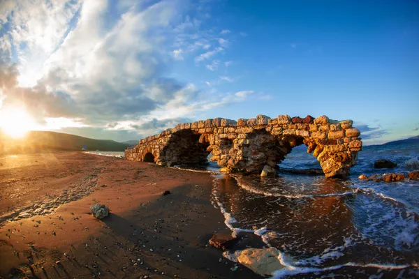 an old roman aqueduct by the sea thumbnail