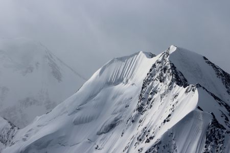 Flying toward Denali as a snow storm approached the mountain range.
