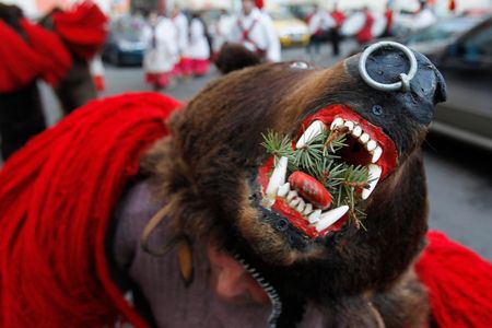 Romanian villagers dress up in real bearskins for ursul.