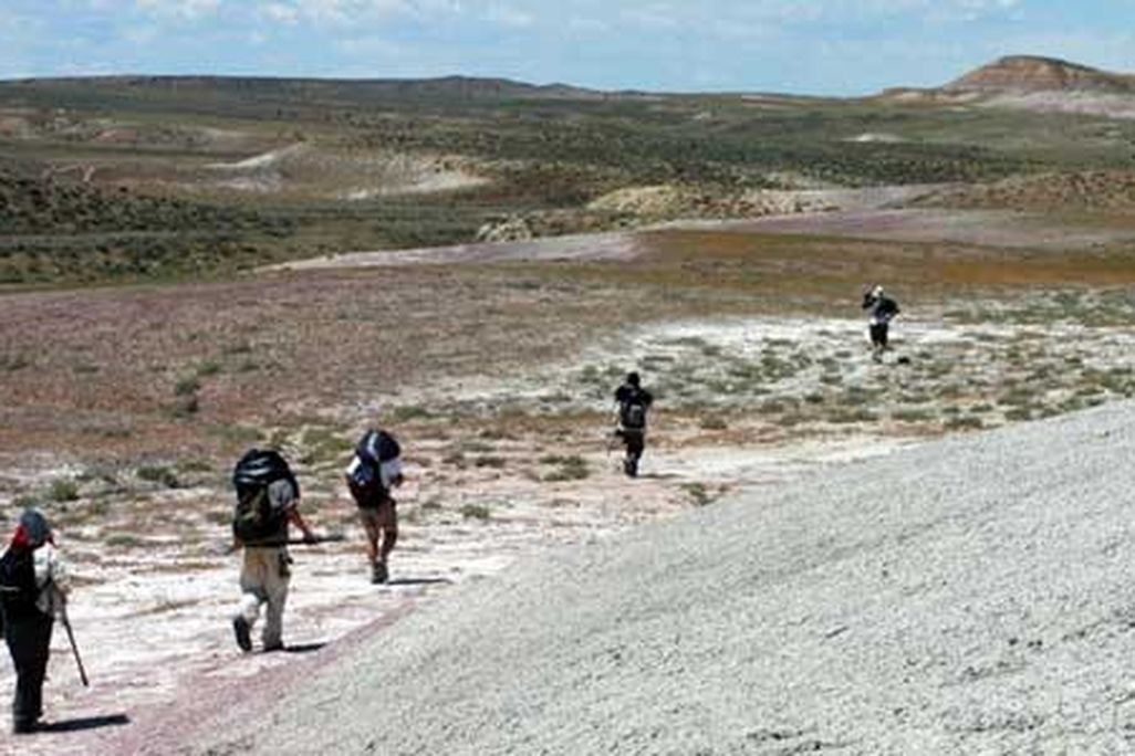 On the march back from the Death March site, everyone carries bags of sediment