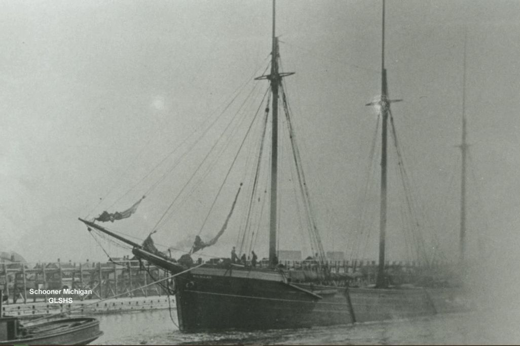 A black and white image of a large schooner