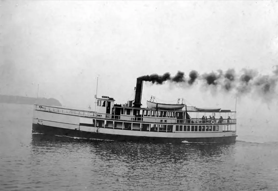Black and white image of small ferry