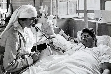 An American aid worker in France writes a letter back home for a wounded soldier in 1918. 