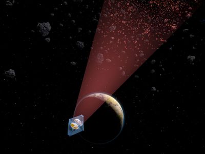 An artist&#39;s illustration shows the James Webb Space Telescope peering out into the solar system toward the asteroid belt.