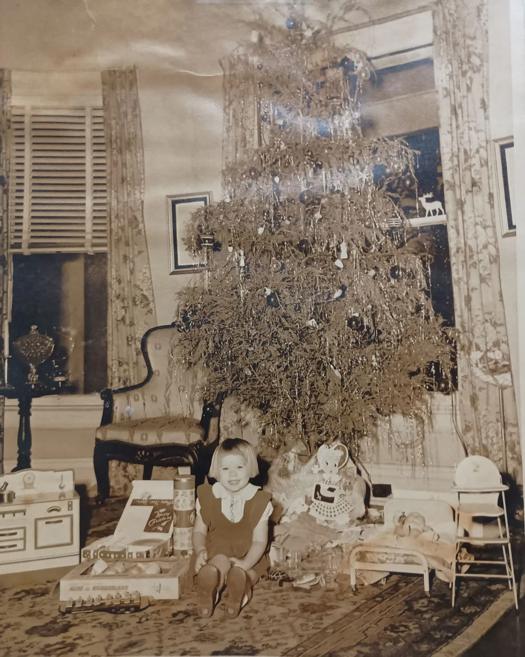 A photo of Sue Nell celebrating Christmas in 1949