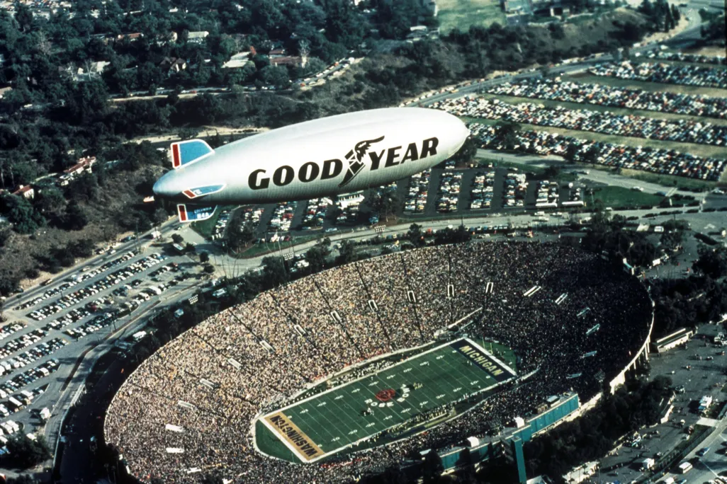 Goodyear blimp flying over the Rose Bowl