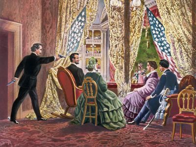 John Wilkes Booth leans forward to shoot President Abraham Lincoln as he watches a play at Ford's Theatre in 1865.