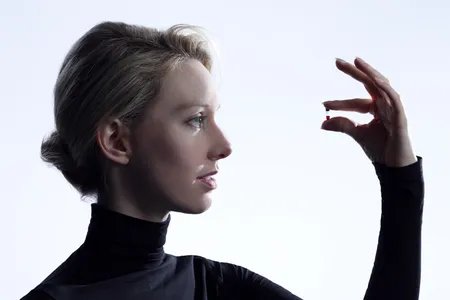 Elizabeth Holmes holds a vial of one drop of blood—all that's needed for a new method of simultaneously testing for a gamut of health threats, such as STDs, heart disease and diabetes.