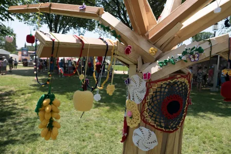 Over the course of the 2018 Folklife Festival, experienced artisans worked hand in hand with crochet novices to decorate a humble tree of life.