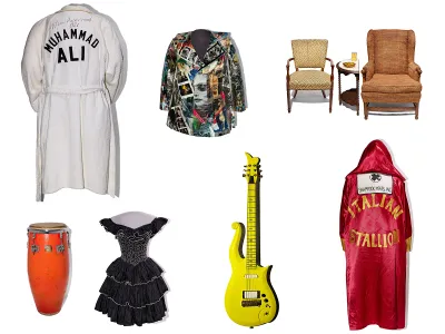 More than 200 artifacts are featured in the new exhibition, &quot;Entertainment Nation,&quot; including clockwise from top left: Muhammad Ali&#39;s warm-up robe; the angel&#39;s jacket from the Broadway production Rent,;&nbsp;chairs from the set of TV&#39;s &quot;All in the Family; a costume worn by Sylvestor Stallone in the film Rocky;&nbsp;Prince&#39;s &quot;Cloud&quot; guitar; a dress worn by performer Gloria Estefan and a conga drum used by musician Emilio Estefan from the Miami Sound Machine.