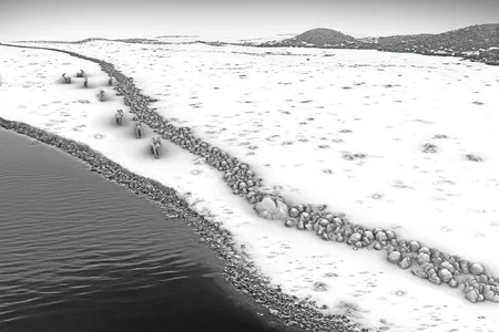 A reconstruction of how the newly discovered wall could have served as a hunting structure during the Stone Age, trapping deer alongside a body of water.