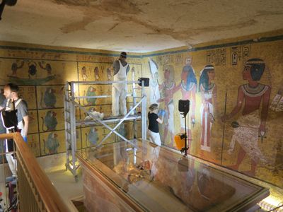 A series of brown spots dotting the tomb's wall paintings were thought to be microbes carried by modern visitors, but researchers found that the marks have actually been around since 1922 opening of the crypt