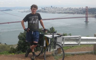 The author and his bike stand about 850 feet above San Francisco on Conzelman Road. Repeated 10 times, this little hill amounts to a world classic of climbing.