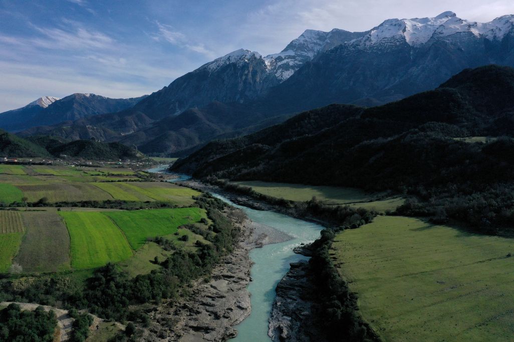 River with mountains in the background