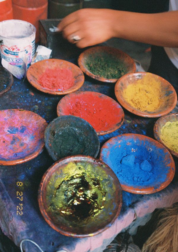 A palette of colors in small bowls thumbnail