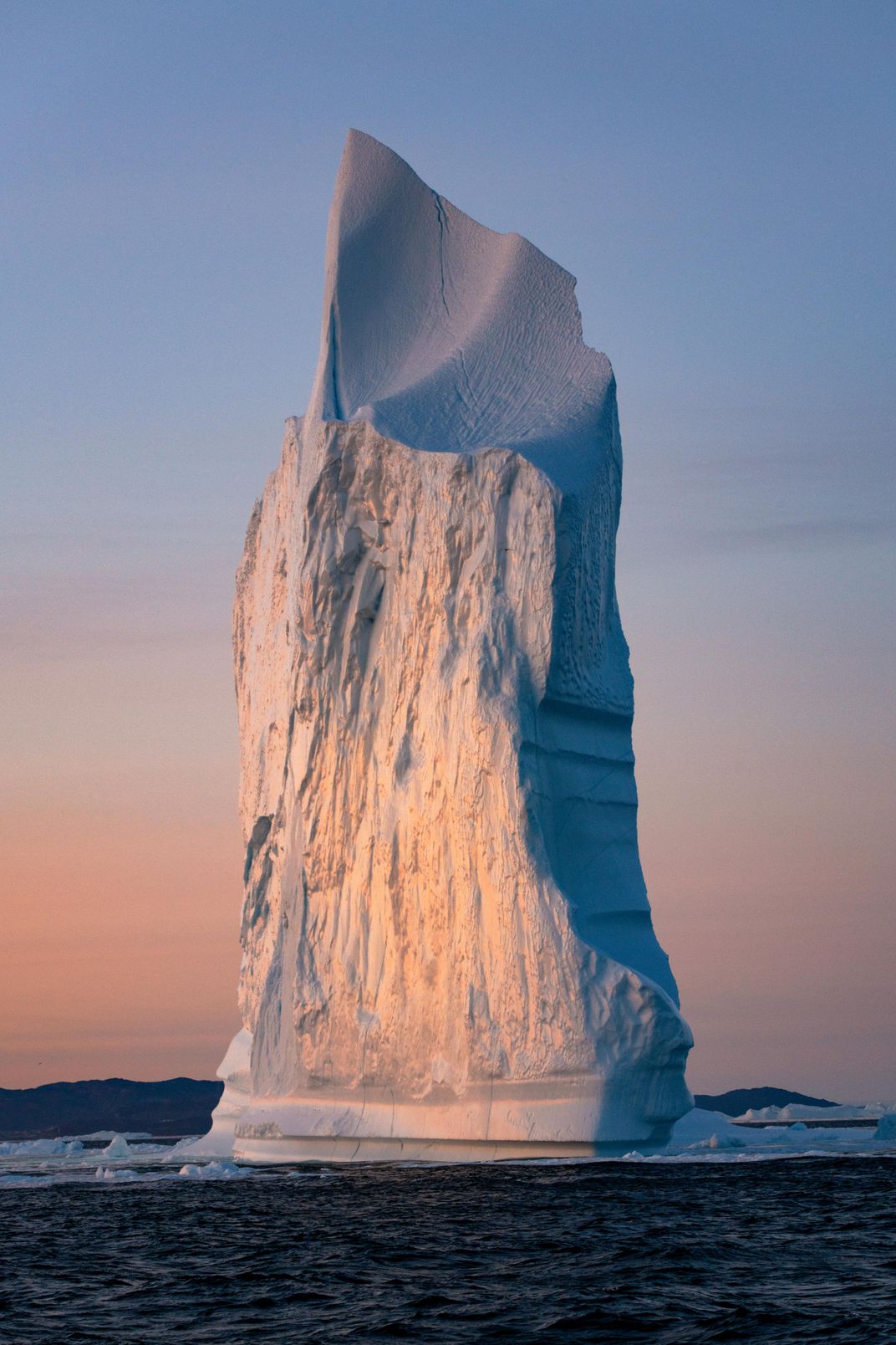 An iceberg in Disko Bay, Greenland. It stands about 40-50 feet tall.