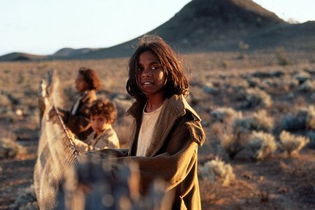 Still from the movie Rabbit-Proof Fence, which chronicles the real-life odyssey of Daisy Kadibil, her sister Molly and her cousin Gracie.
