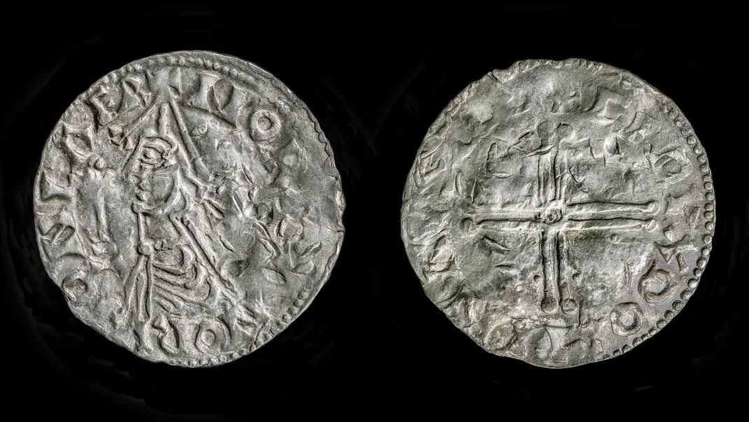 Two sides of the same coin against a black backdrop
