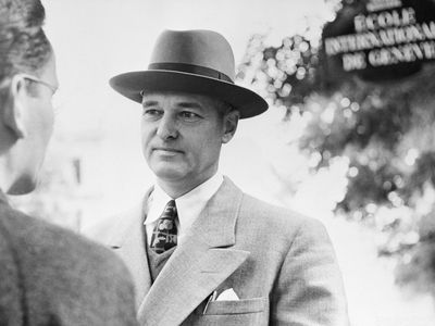 U.S. Ambassador to Russia, George F. Kennan, chats with a newsman after the Russian government told the U.S. State Department that Kennan must be recalled immediately. The Russians charged that the ambassador made completely false statements hostile to the Soviet Union. At the time, Russia demanded his recall (three days ago) Kennan was in Geneva, where he'd been visiting his daughter who is a student at the International School. U.S. Secretary of State Dean Acheson called the Russian charges, outrageous.
