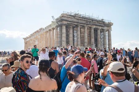 As many as 23,000 tourists visited the Acropolis per day last summer.