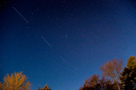 US satellite SpaceX Starlink 5 is seen in the night passing above Denmark, on April 21, 2020.
