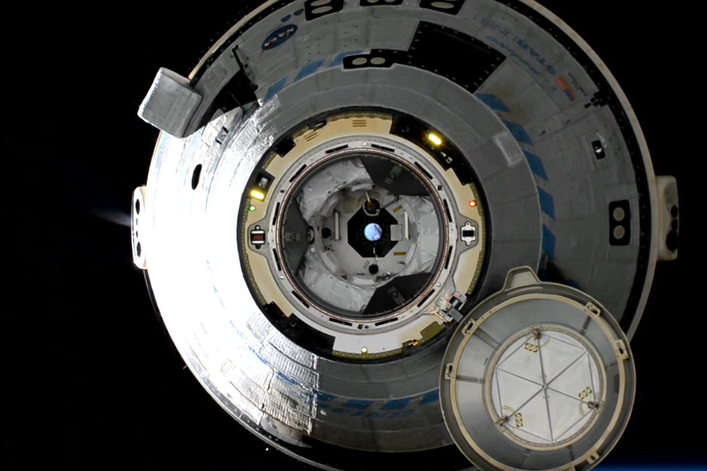 Starliner on a dark background