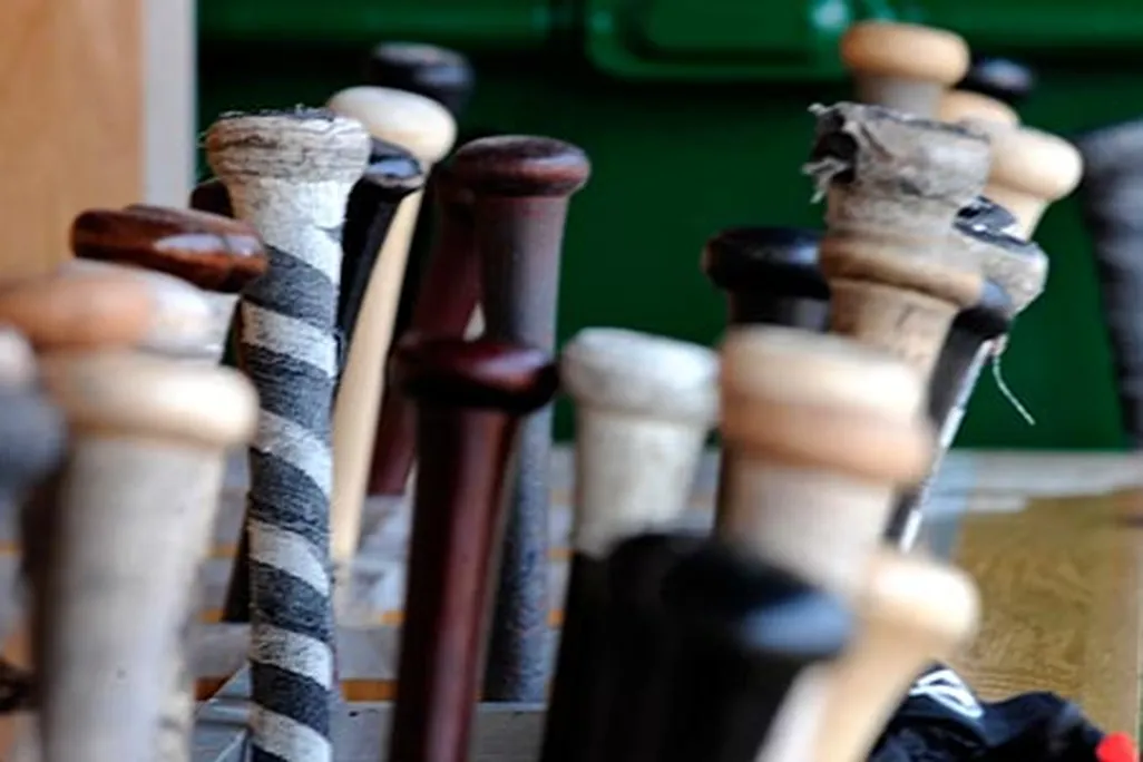 Baseball bats in dugout