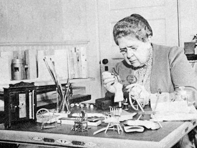 Frances Glessner Lee hard at work on her one of her deadly dioramas, The Nutshell Studies of Unexplained Death.