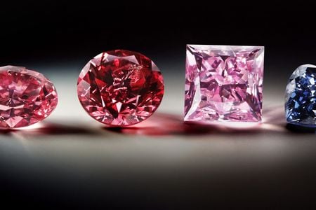 Pink diamonds form when the gems&#39; crystalline structure gets bent under intense pressure.