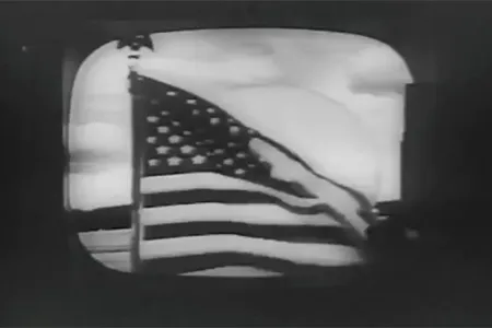 An American flag waving in Andover, Maine. This was the first video ever transmitted by commercial satellite.