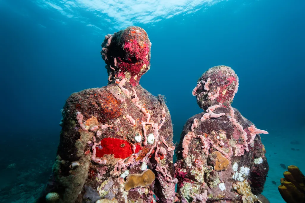 Two colorful underwater sculptures