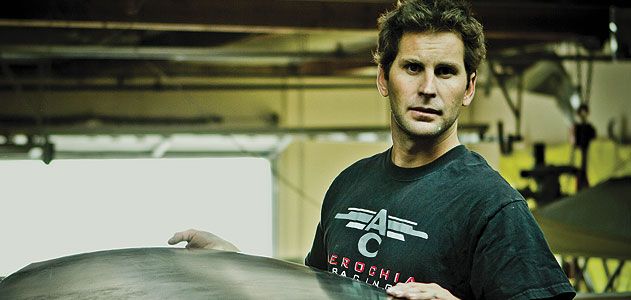 Andy Chiavetta inspects a new carbonfiber wing for his LT-1 kitplane at his shop in San Clemente, California.