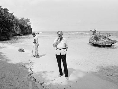 British novelist Ian Fleming on the beach near Goldeneye, his Jamaica home, on February 23, 1964