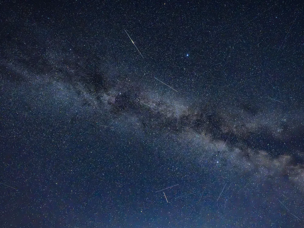 the Milky Way seen from Earth, with small white lines across it
