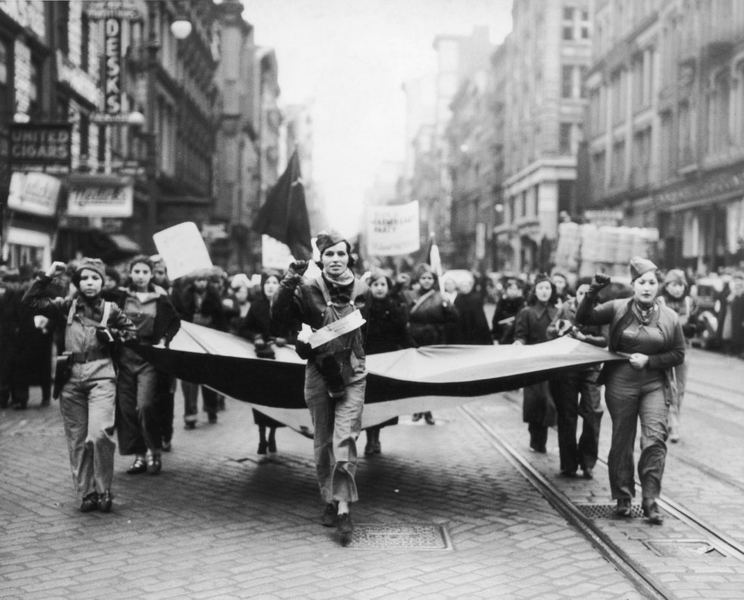 Women marching against anti-fascism