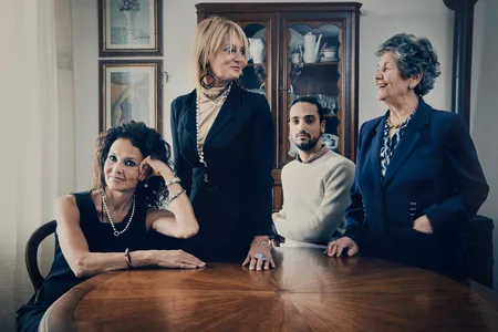 Three generations of the Marsili family at home in Siena, Italy. From left: Maria Elena; Letizia and her son Ludovico; matriarch Maria Domenica.