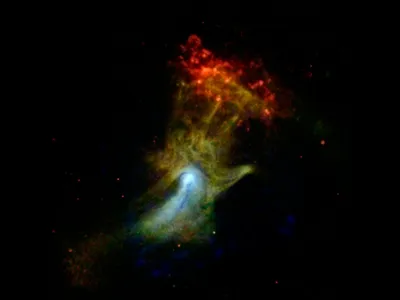 Nicknamed the Hand of God, this pulsar wind nebula is powered by a pulsar: the leftover, dense core of a star that blew up in a supernova explosion. Before astronomers had any idea what they were, Jocelyn Bell Burnell found the signal of a pulsar in her telescope data in 1967.