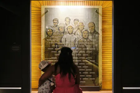 The memorial wall inside the new Africatown Heritage House