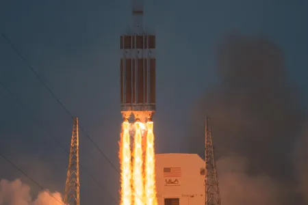The United Launch Alliance Delta IV Heavy Rocket lifts off with the Orion spacecraft for its first test flight