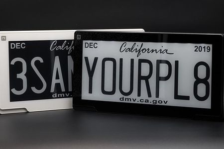 The plate’s display resembles a Kindle, except that letters and numbers are made up of monochromatic “e-ink.”